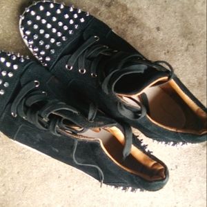 Christian Louboutin red bottom sneakers with spikes